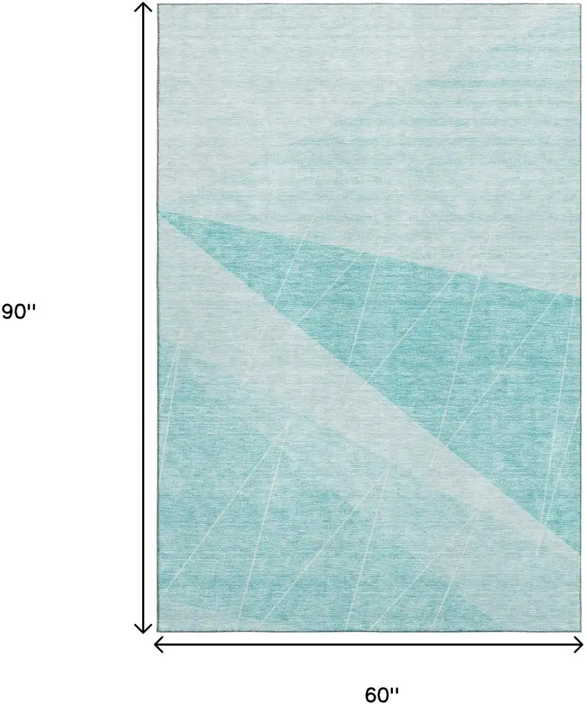 Teal And Ivory Geometric Washable Area Rug With UV Protection Photo 3