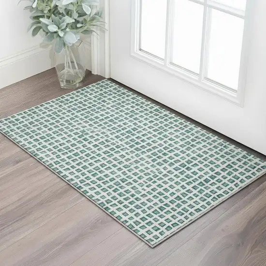 Teal And Ivory Geometric Washable Area Rug With UV Protection Photo 2