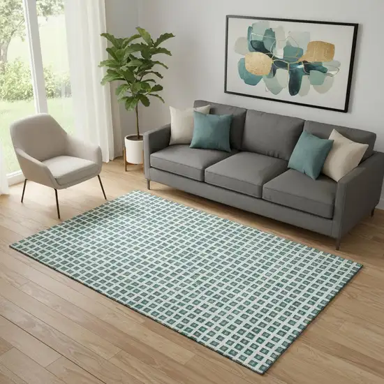 Teal And Ivory Geometric Washable Area Rug With UV Protection Photo 1
