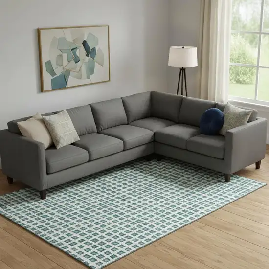 Teal And Ivory Geometric Washable Area Rug With UV Protection Photo 1