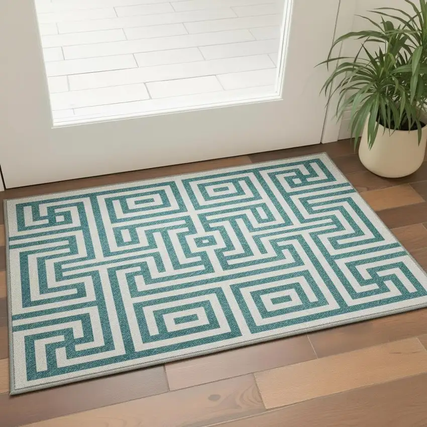 Teal And Ivory Geometric Washable Area Rug With UV Protection Photo 2