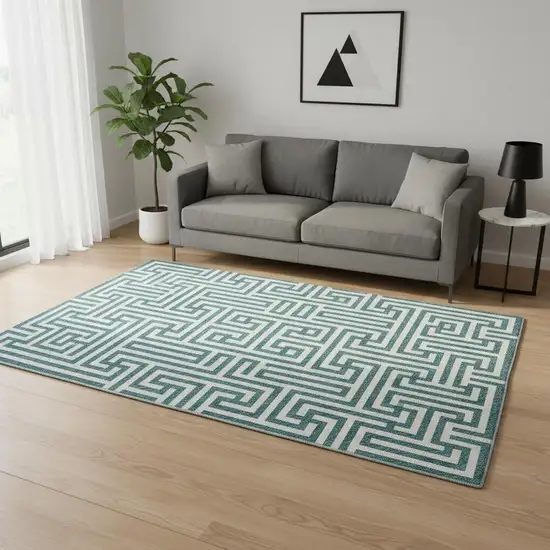 Teal And Ivory Geometric Washable Area Rug With UV Protection Photo 2