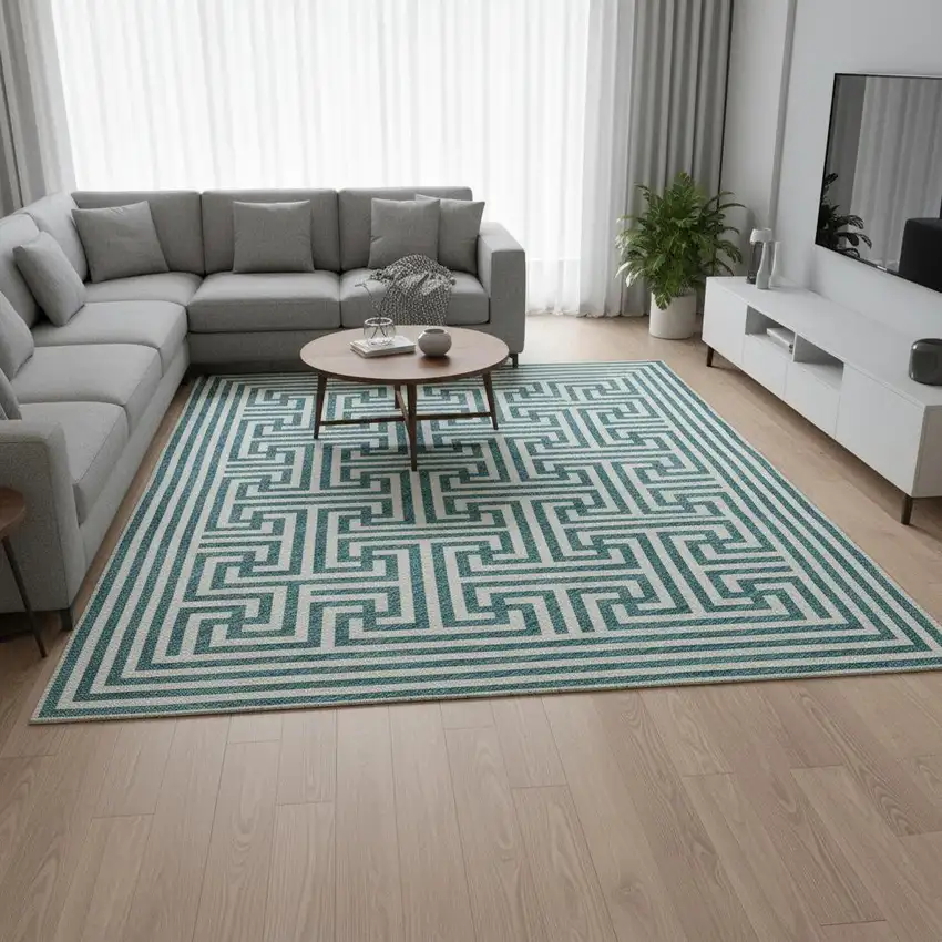 Teal And Ivory Geometric Washable Area Rug With UV Protection Photo 2