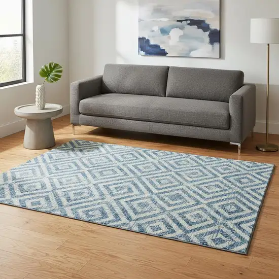 Teal And Ivory Geometric Washable Area Rug With UV Protection Photo 2