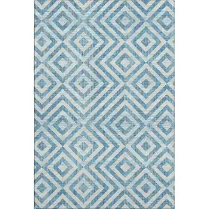 Photo of Teal And Ivory Geometric Washable Area Rug With UV Protection