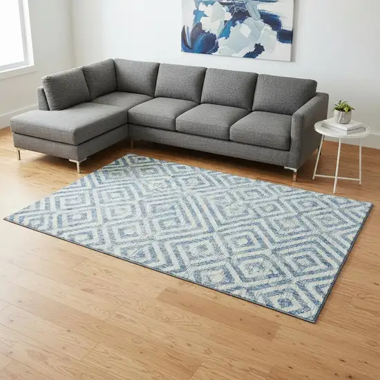 Teal And Ivory Geometric Washable Area Rug With UV Protection Photo 2