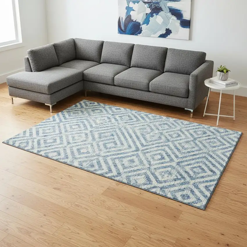 Teal And Ivory Geometric Washable Area Rug With UV Protection Photo 2