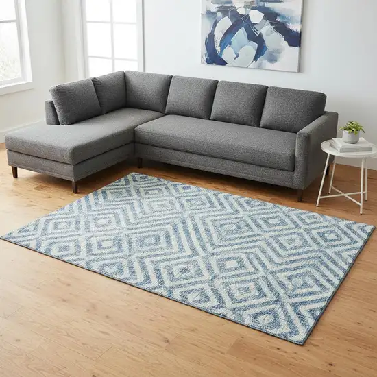 Teal And Ivory Geometric Washable Area Rug With UV Protection Photo 2