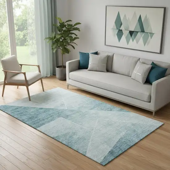 Teal And Ivory Geometric Washable Area Rug With UV Protection Photo 1