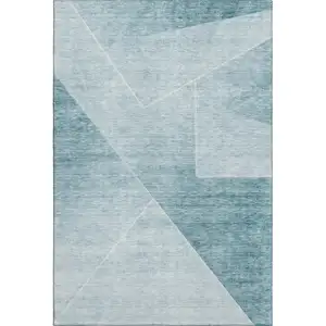 Photo of Teal And Ivory Geometric Washable Area Rug With UV Protection