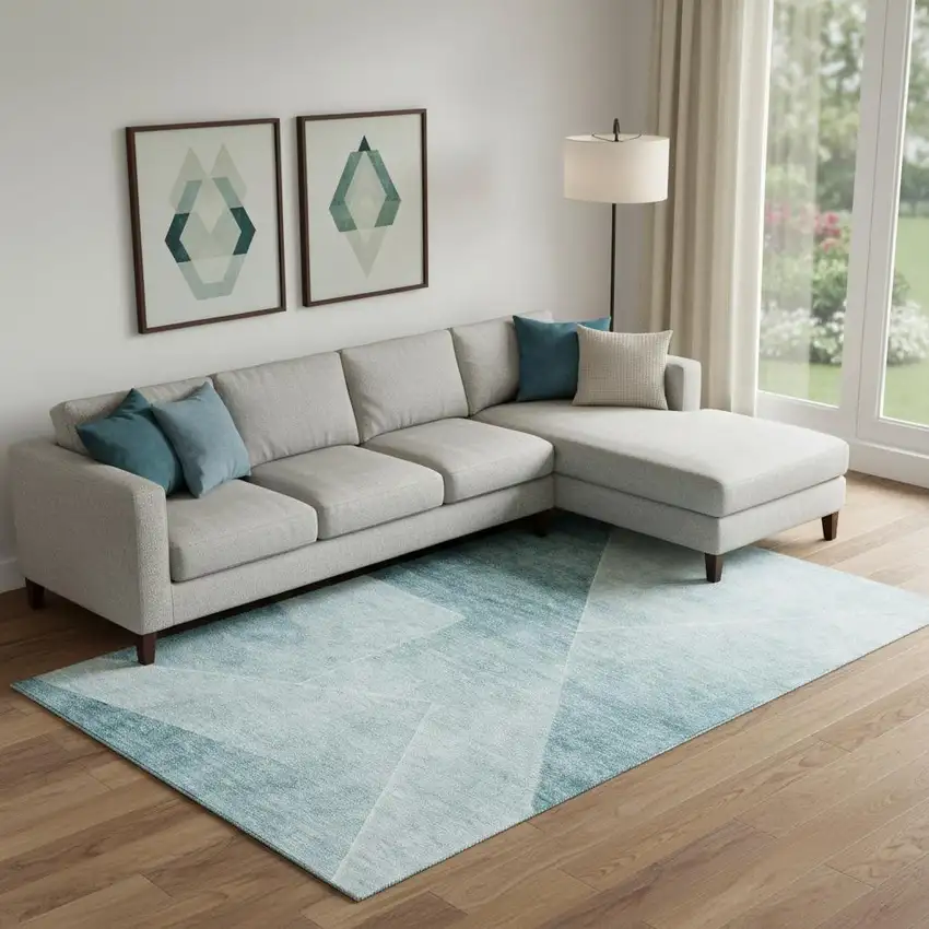 Teal And Ivory Geometric Washable Area Rug With UV Protection Photo 1