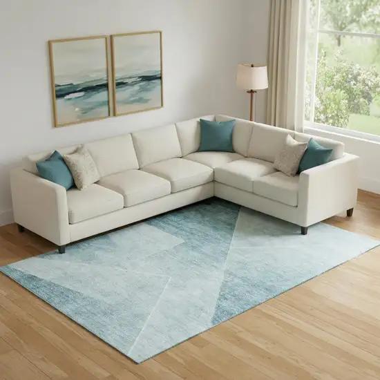Teal And Ivory Geometric Washable Area Rug With UV Protection Photo 1