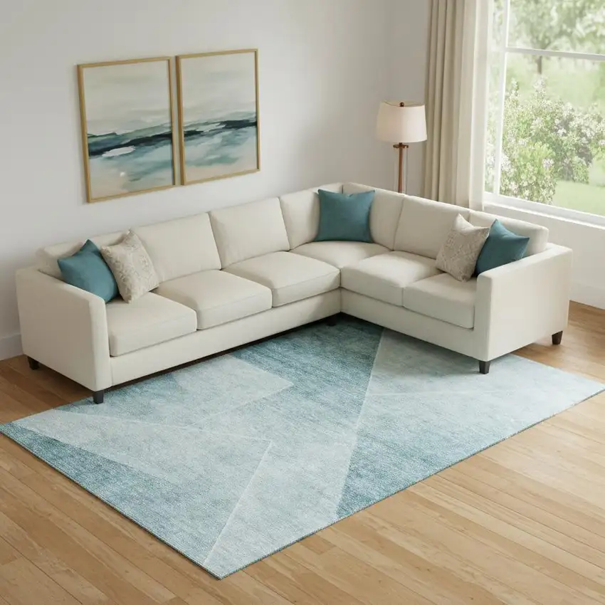 Teal And Ivory Geometric Washable Area Rug With UV Protection Photo 1