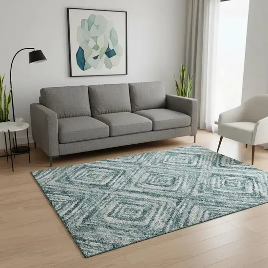 Teal And Ivory Geometric Washable Area Rug With UV Protection Photo 2