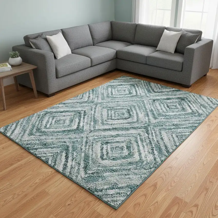 Teal And Ivory Geometric Washable Area Rug With UV Protection Photo 2