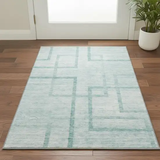 Teal And Ivory Geometric Washable Area Rug With UV Protection Photo 2