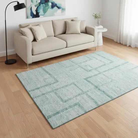Teal And Ivory Geometric Washable Area Rug With UV Protection Photo 2