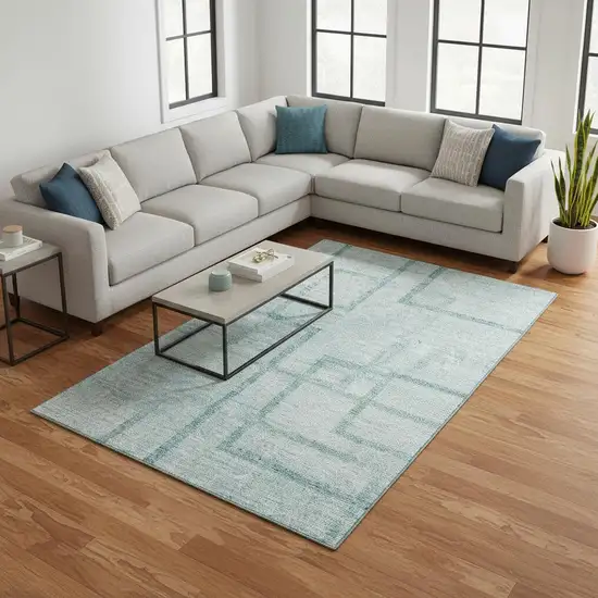 Teal And Ivory Geometric Washable Area Rug With UV Protection Photo 2