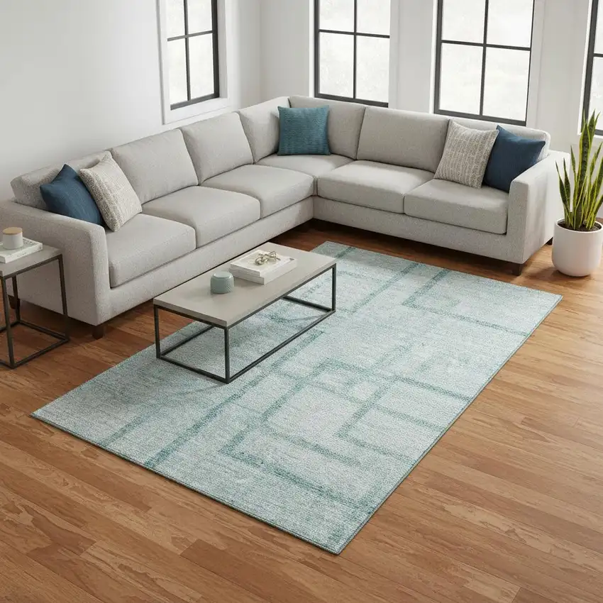 Teal And Ivory Geometric Washable Area Rug With UV Protection Photo 2