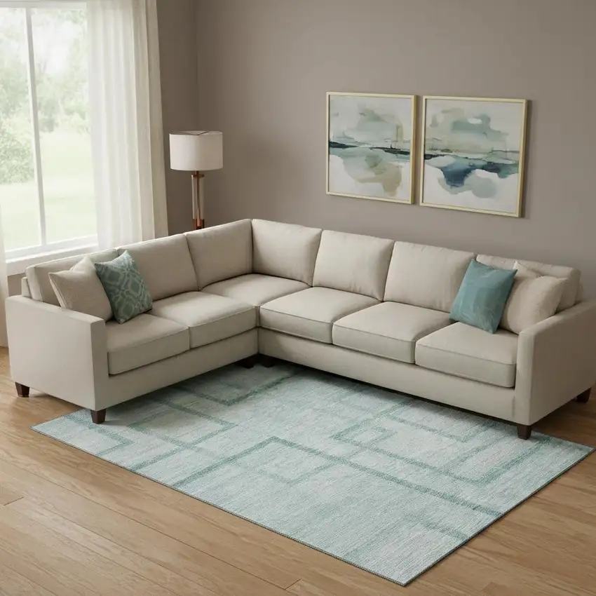 Teal And Ivory Geometric Washable Area Rug With UV Protection Photo 1