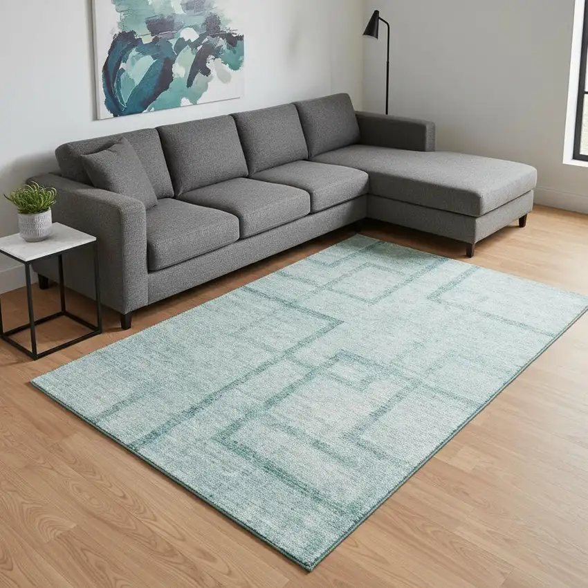 Teal And Ivory Geometric Washable Area Rug With UV Protection Photo 2