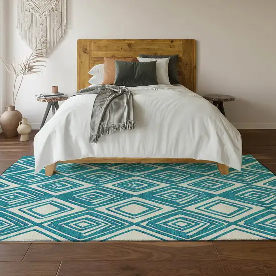 Teal And Ivory Geometric Washable Area Rug With UV Protection Photo 7