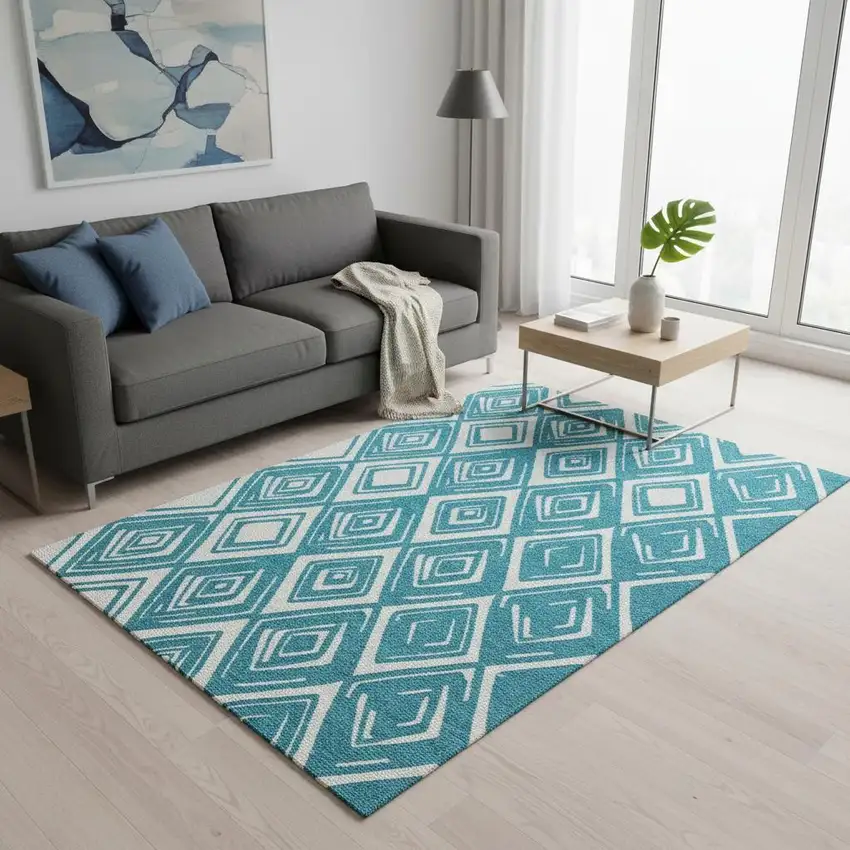 Teal And Ivory Geometric Washable Area Rug With UV Protection Photo 1