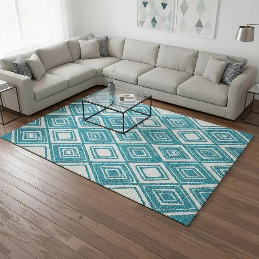 Teal And Ivory Geometric Washable Area Rug With UV Protection Photo 1