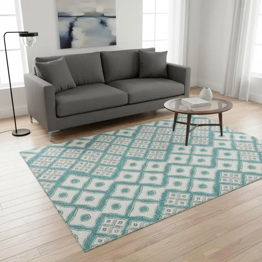 Teal And Ivory Geometric Washable Area Rug With UV Protection Photo 1