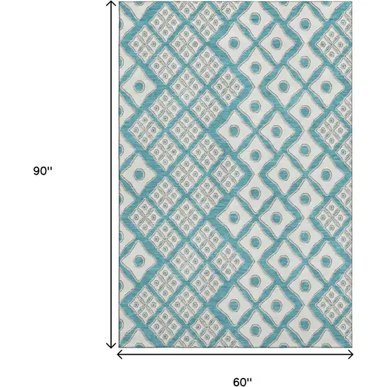 Teal And Ivory Geometric Washable Area Rug With UV Protection Photo 3