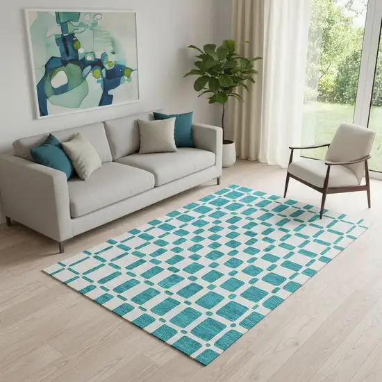 Teal And Ivory Geometric Washable Area Rug With UV Protection Photo 1