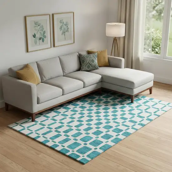 Teal And Ivory Geometric Washable Area Rug With UV Protection Photo 1