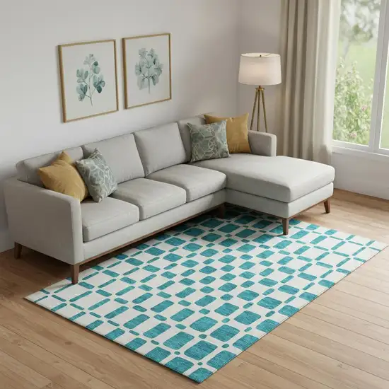 Teal And Ivory Geometric Washable Area Rug With UV Protection Photo 1