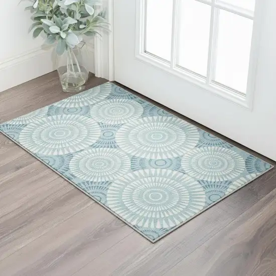 Teal And Ivory Geometric Washable Area Rug With UV Protection Photo 2