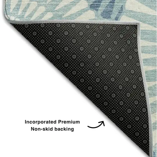 Teal And Ivory Geometric Washable Area Rug With UV Protection Photo 7
