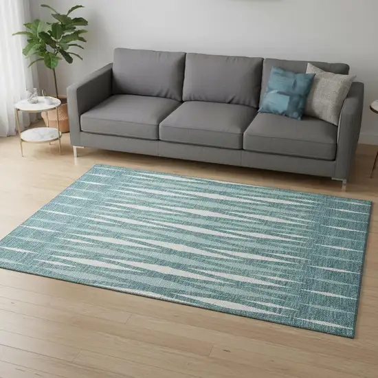 Teal And Ivory Geometric Washable Area Rug With UV Protection Photo 2