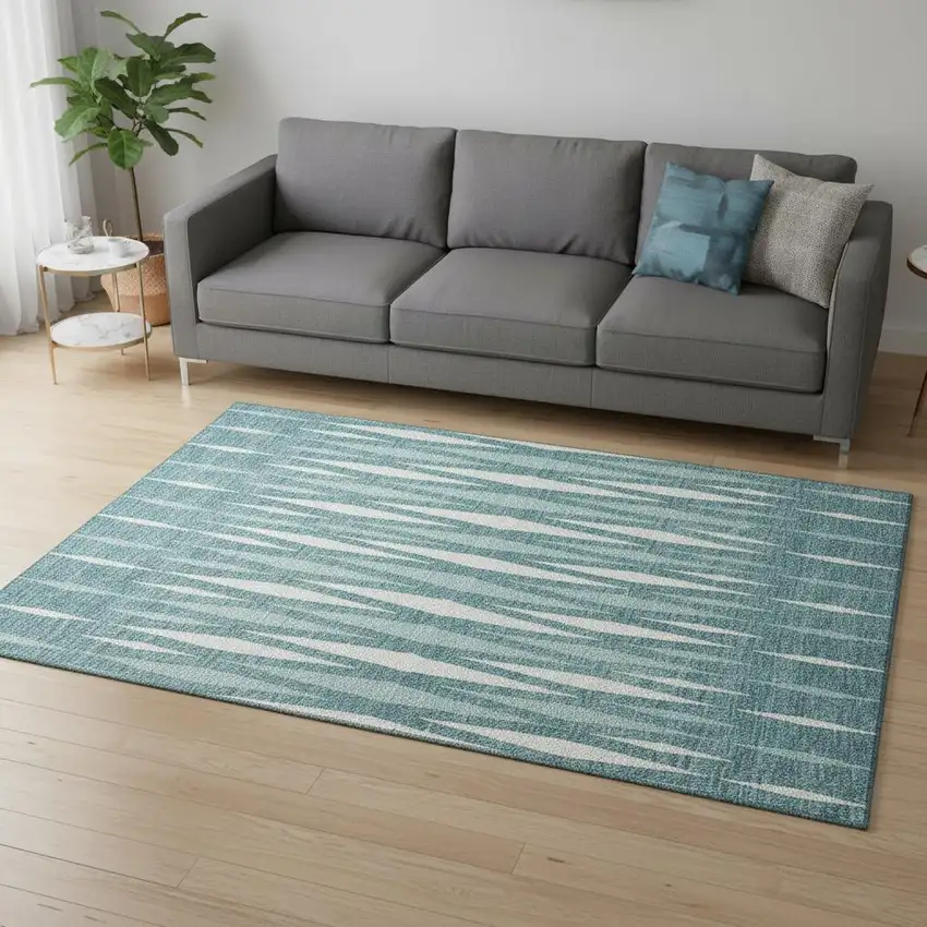 Teal And Ivory Geometric Washable Area Rug With UV Protection Photo 2