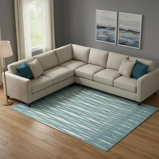 Teal And Ivory Geometric Washable Area Rug With UV Protection Photo 1