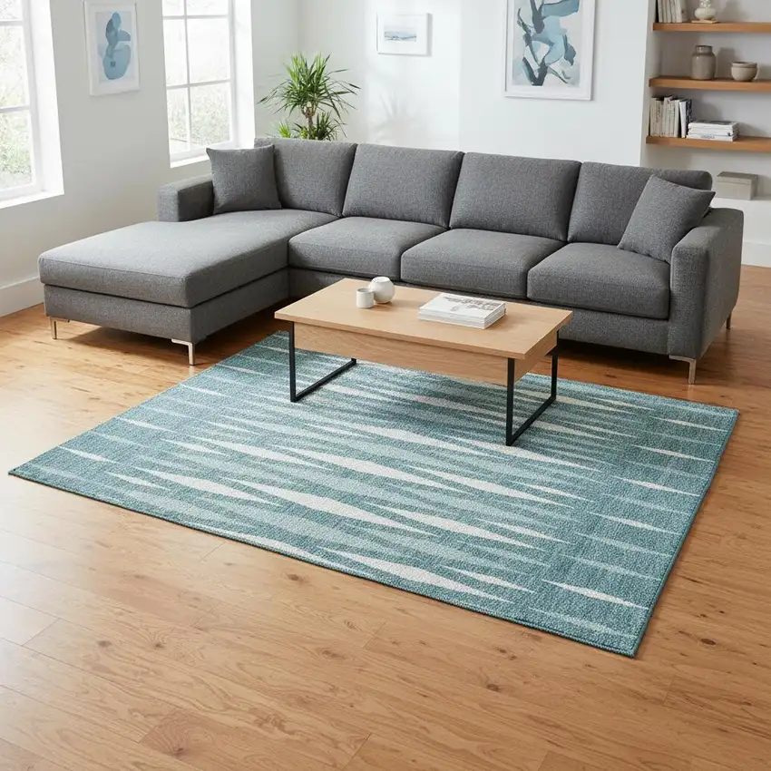 Teal And Ivory Geometric Washable Area Rug With UV Protection Photo 2