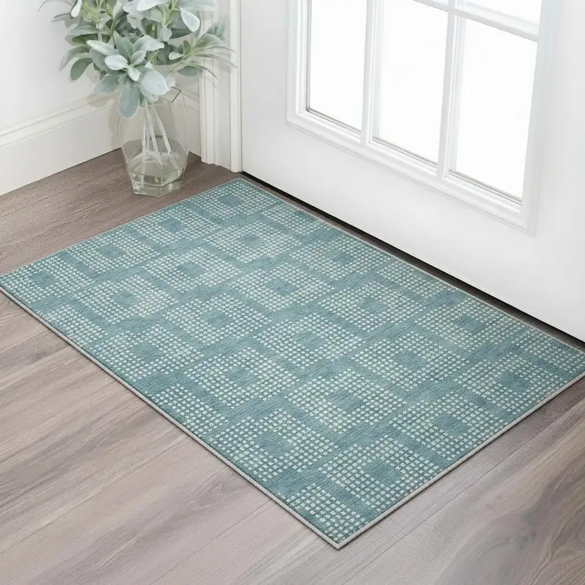 Teal And Ivory Geometric Washable Area Rug With UV Protection Photo 2