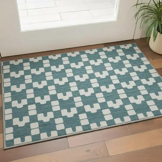 Teal And Ivory Geometric Washable Area Rug With UV Protection Photo 2