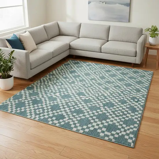 Teal And Ivory Geometric Washable Area Rug With UV Protection Photo 2