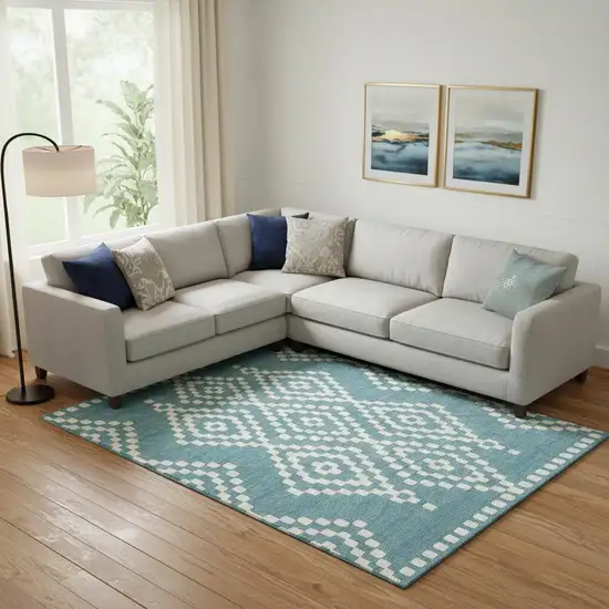 Teal And Ivory Geometric Washable Area Rug With UV Protection Photo 1