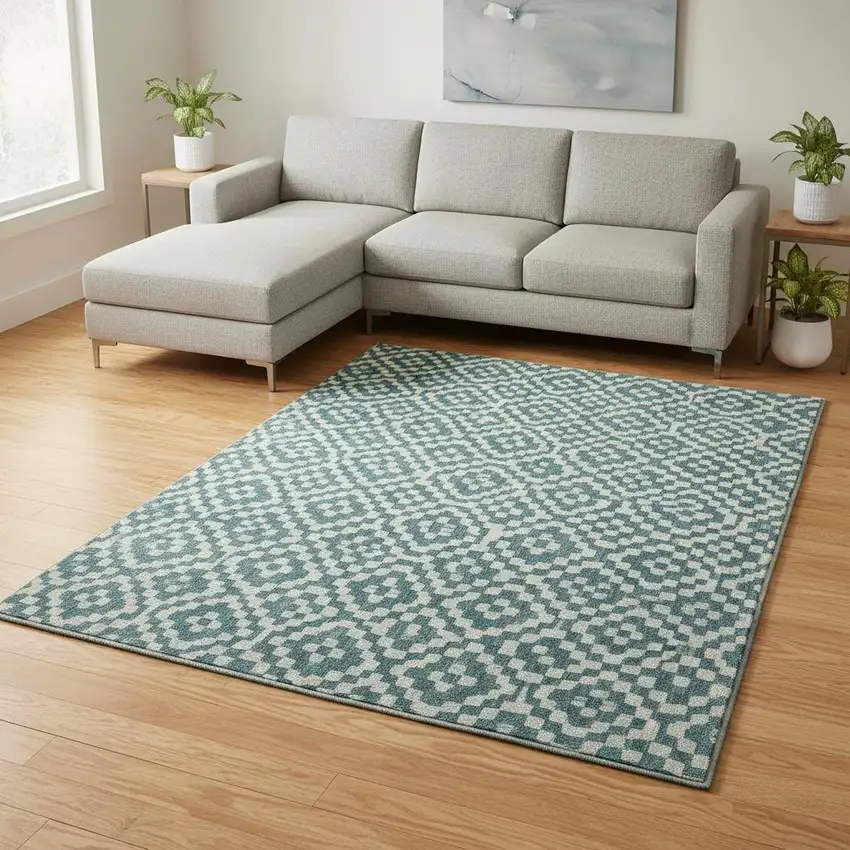Teal And Ivory Geometric Washable Area Rug With UV Protection Photo 2