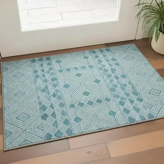 Teal And Ivory Geometric Washable Area Rug With UV Protection Photo 2