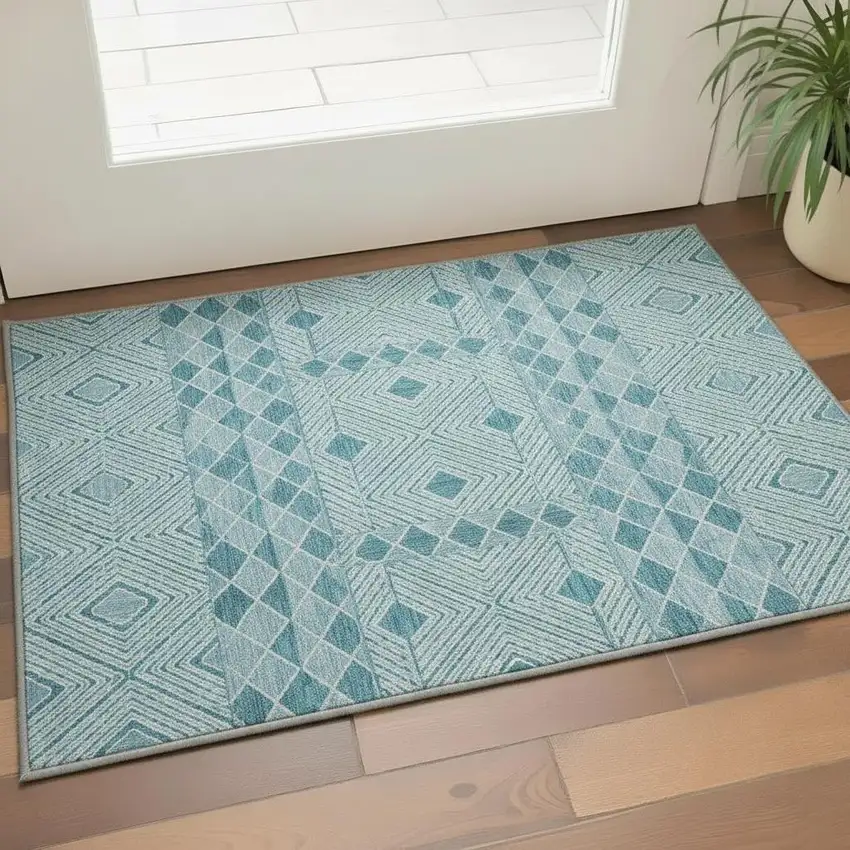 Teal And Ivory Geometric Washable Area Rug With UV Protection Photo 2