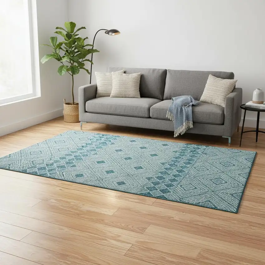Teal And Ivory Geometric Washable Area Rug With UV Protection Photo 2