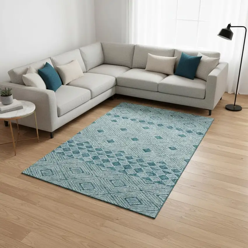 Teal And Ivory Geometric Washable Area Rug With UV Protection Photo 2