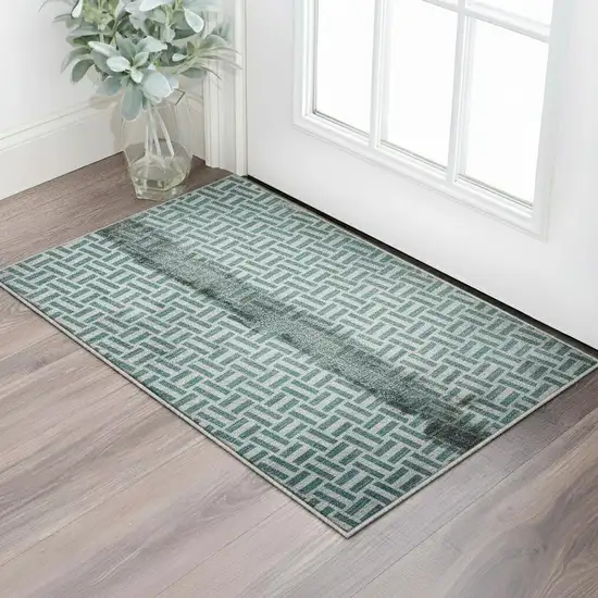 Teal And Ivory Geometric Washable Area Rug With UV Protection Photo 2