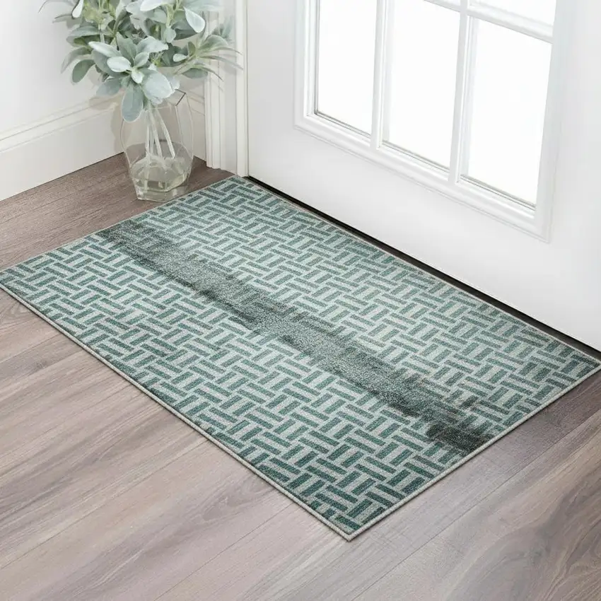 Teal And Ivory Geometric Washable Area Rug With UV Protection Photo 2